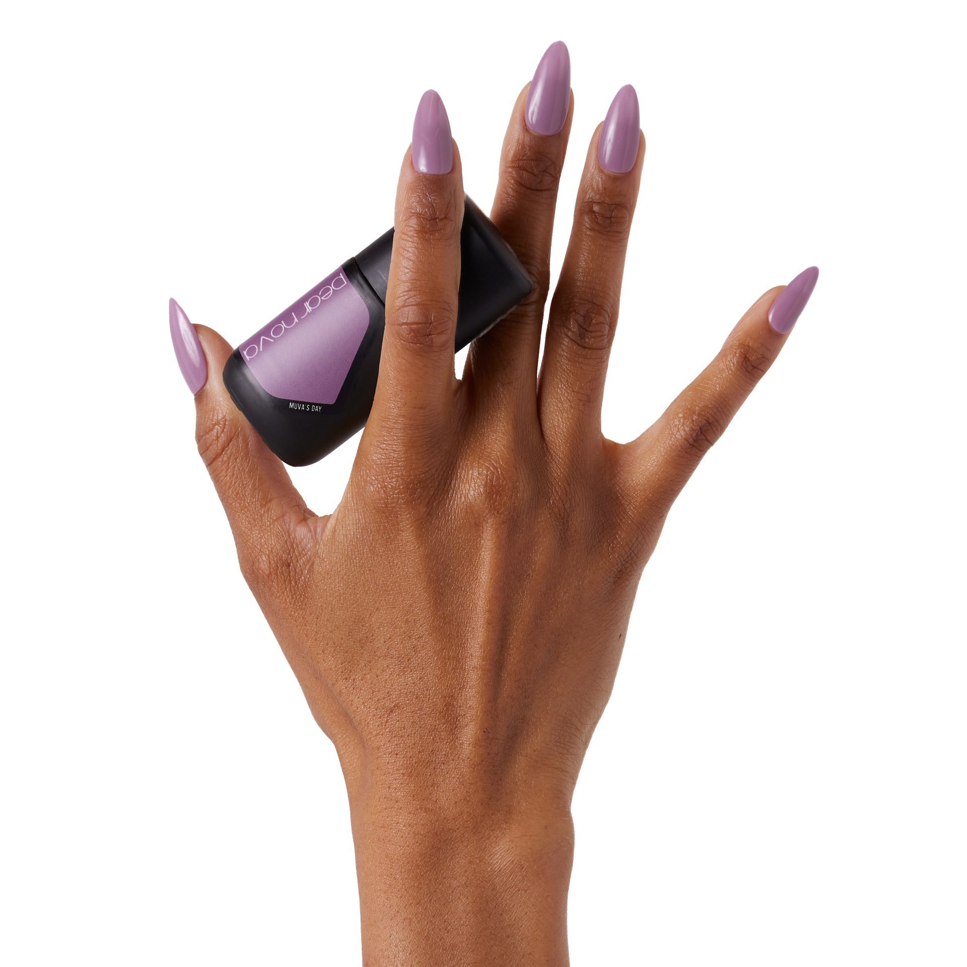 brown skin hand model holding bottle of nail lacquer with almond shaped painted nails 