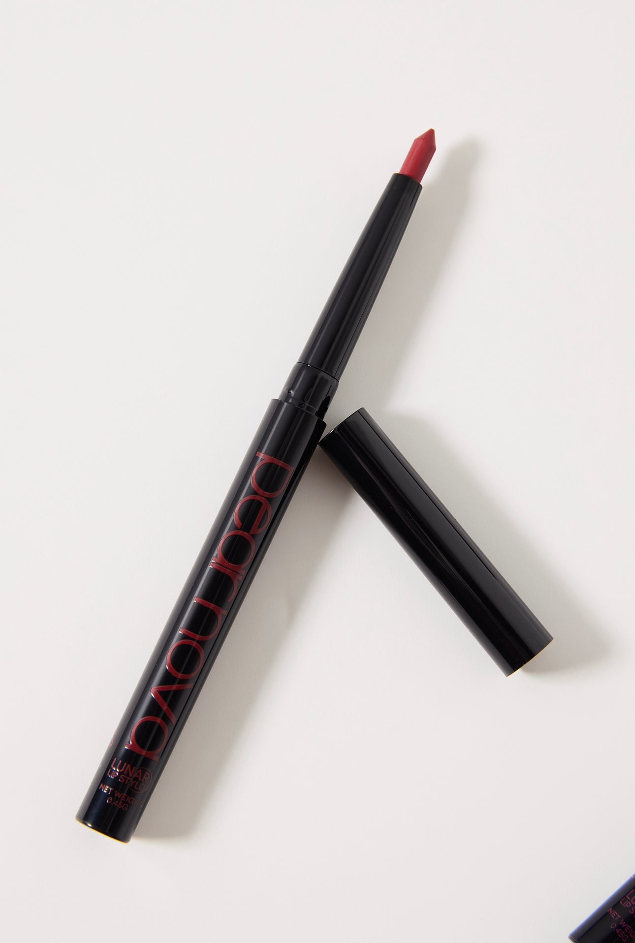 Starlet Lunar Lip Stylo with cap off to show lip liner
