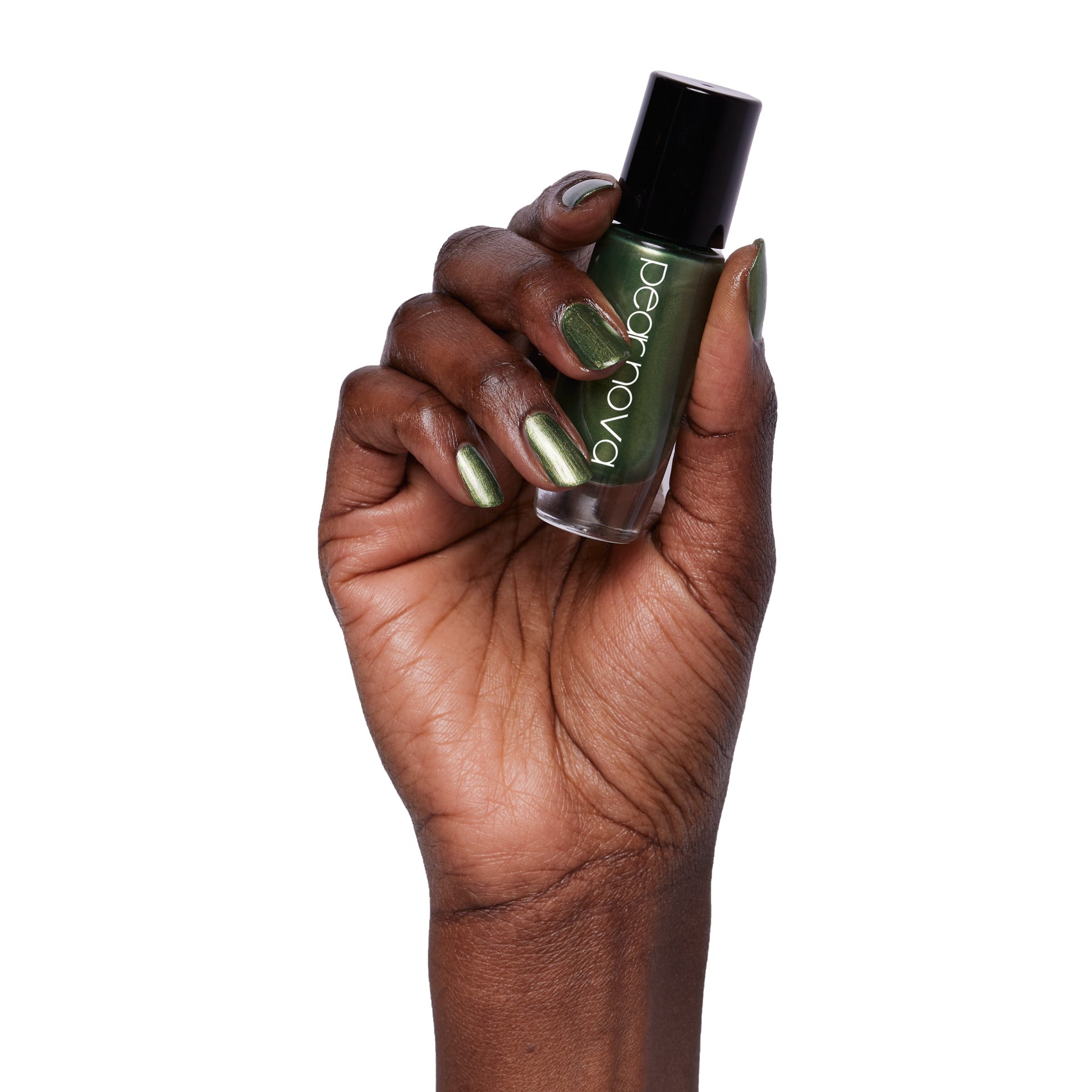 brown skin hand model holding bottle of nail lacquer with Pineapple Skies painted nails