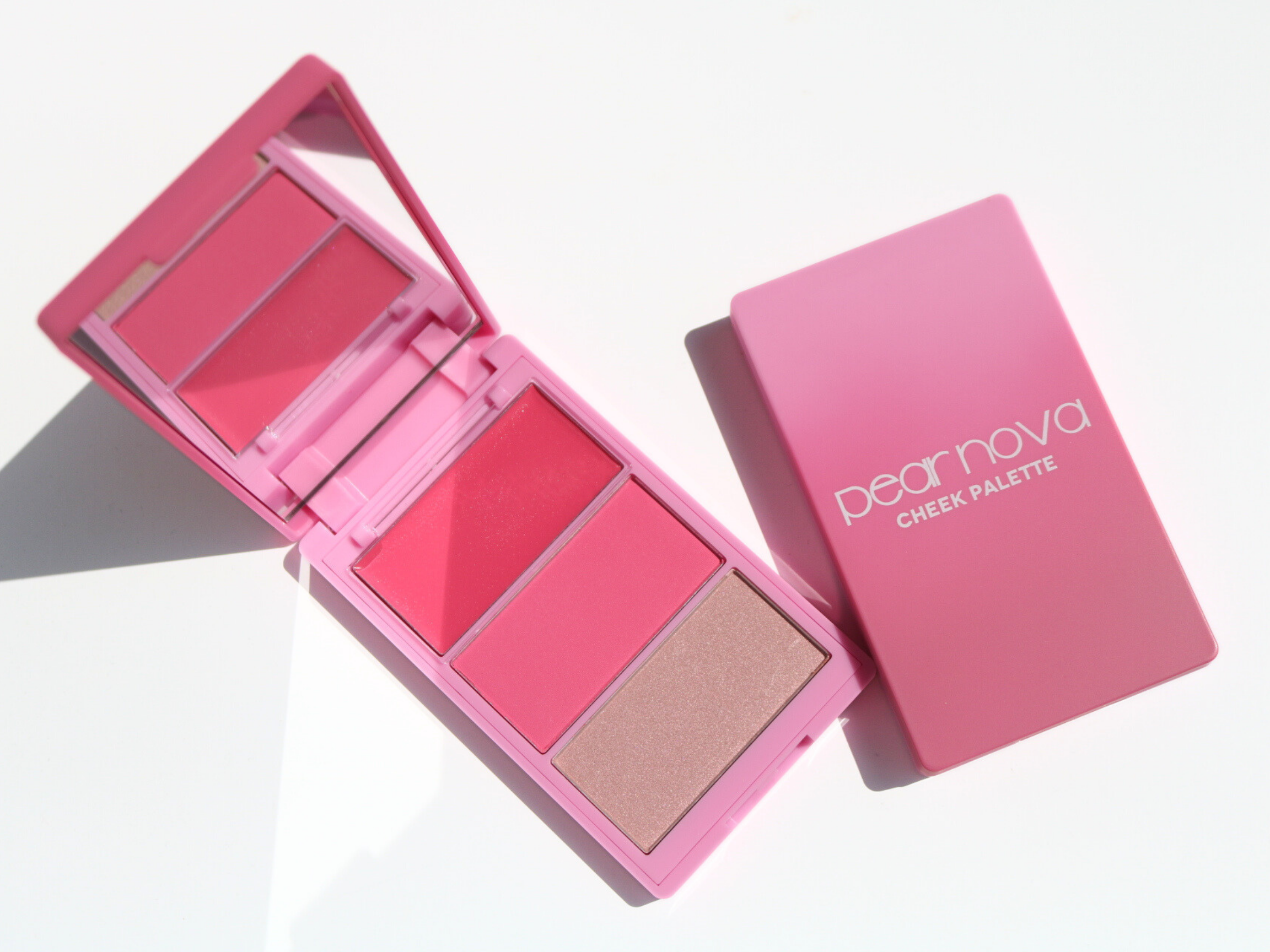 Pear Nova cheek palette with three shades on a white background