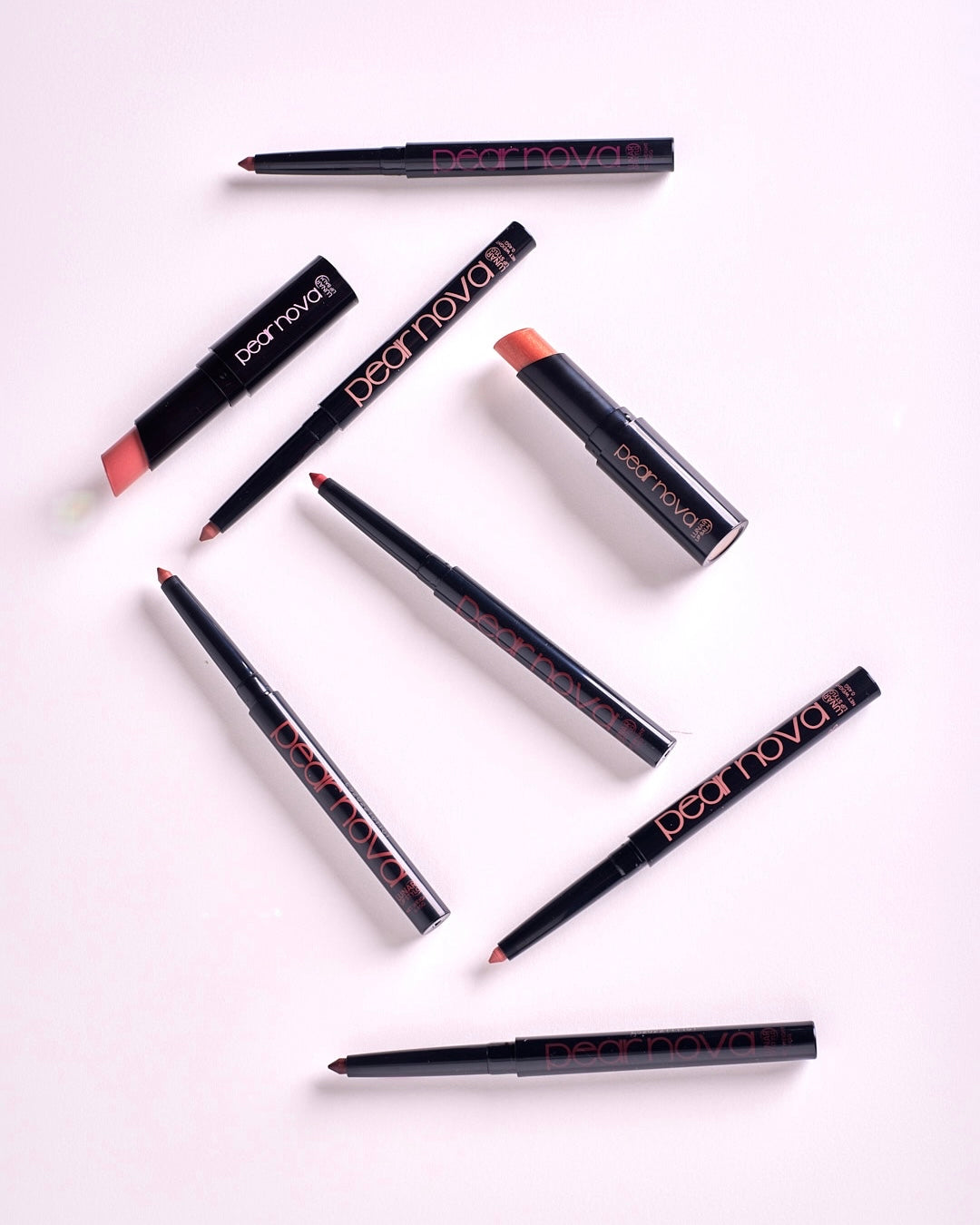 All products in the lip stylo + lip balm bundle including 2 lip balms and 6 lip liners