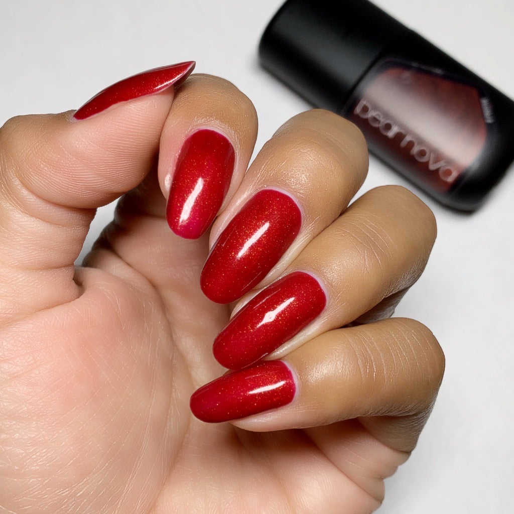 light brown skin hand model with red nails